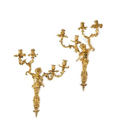 Pair of chased and gilded bronze sconces...