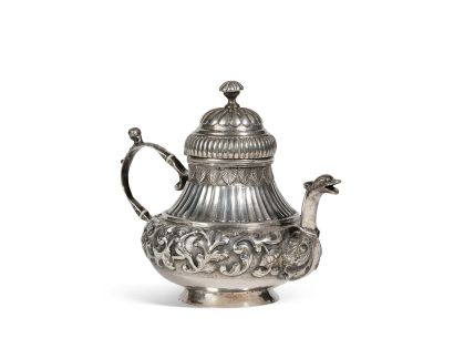 Silver teapot with pedestal, the body with...
