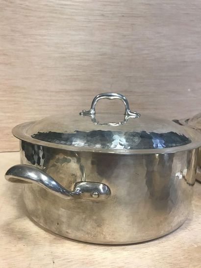  CHRISTIAN DIOR 
Part of cookware in hammered metal including 1 terrine, 1 casserole...