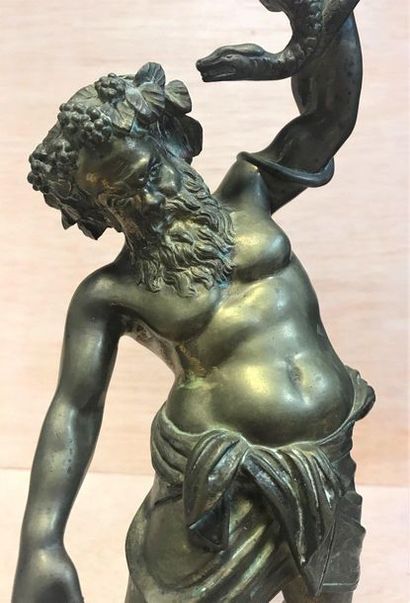  Silène 
Bronze lamp base depicting Silenus crowned with vine branches brandishing...