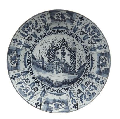 DELFT Large round earthenware dish with blue...