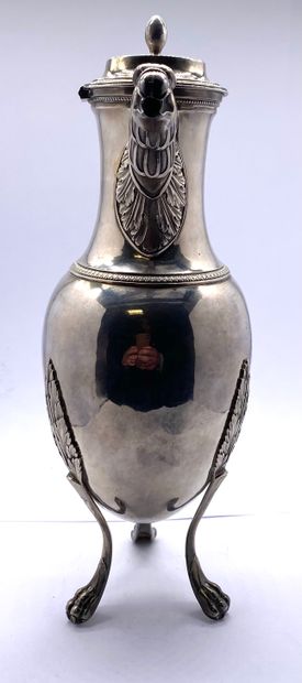  Silver coffee pot in the shape of an urn, on a tripod base with claws joined to...