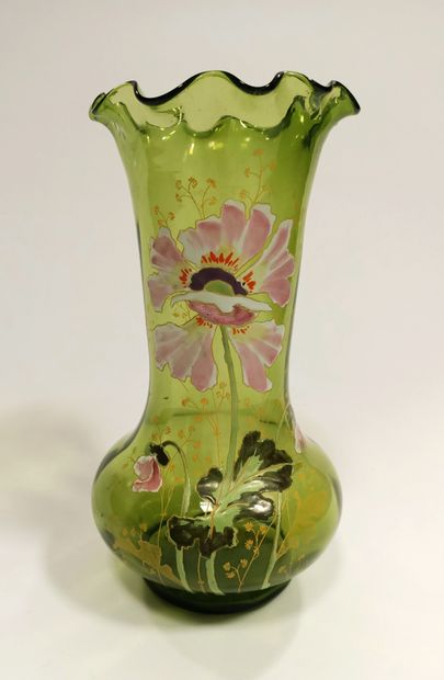 A green tinted glass tubular vase decorated...