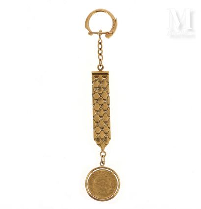 Porte-clefs 20 FF or Porte-clefs en deux tons d'ors jaune et gris 18 K (750 °/°°)...
