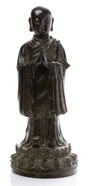 Chine, période Ming, XVIe siècle 
Sujet en bronze de patine brune représentant un...