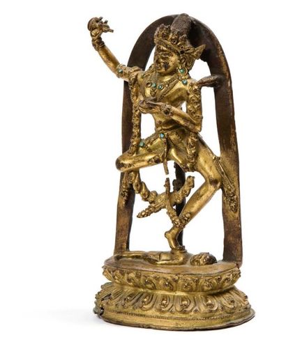 Tibet XVIe-XVIIe siècle Sujet en bronze doré rehaussé de turquoises, représentant...
