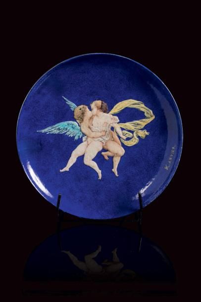  Théodore DECK (1823 - 1891) 
Plat circulaire en faïence à couverte émaillée bleue,...