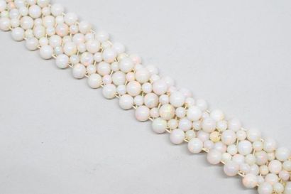 null Bracelet en or jaune 18k (750) et argent orné de 4 rangs de perles d'opale....
