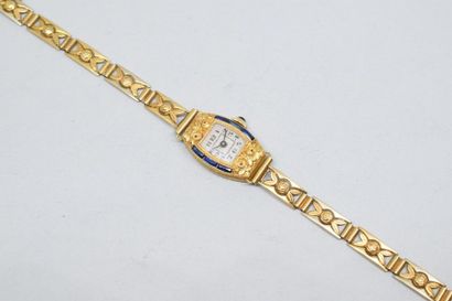 null Montre bracelet de dame en or jaune 18k (750), la lunetteornée de trois saphirs...