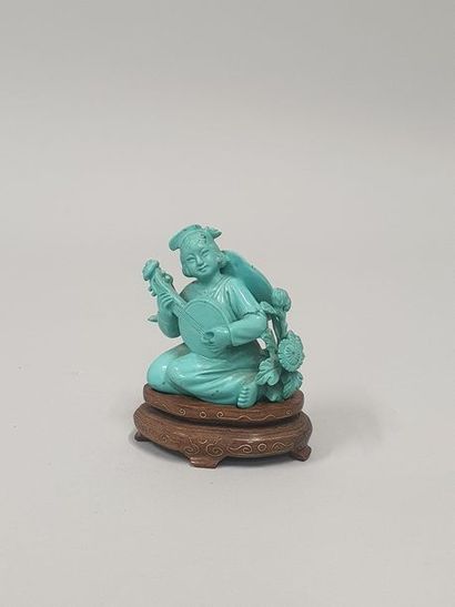 Musicienne en turquoise sculptée.

Chine,...