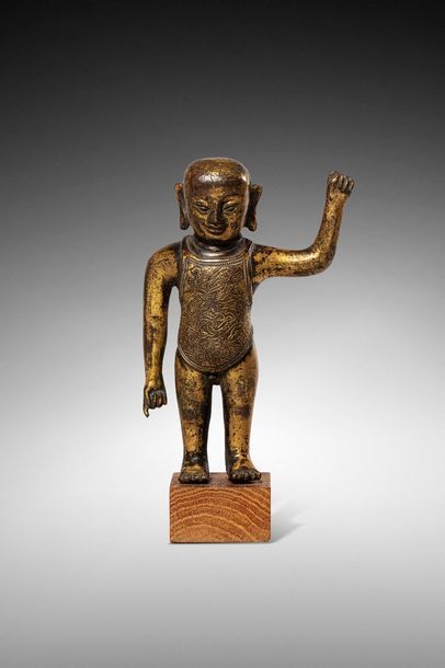  CHINE - Epoque MING (1368 - 1644) 
Statuette de bouddha enfant debout en bronze...