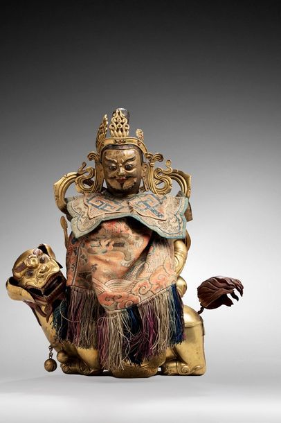  Tibet, XVIIIe siècle. 
Sujet en bronze doré et cuivre repoussé, avec rehauts de...