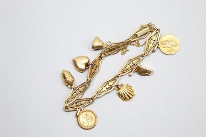 null Bracelet breloques en or jaune 18k (750).

Longueur : env. 19 cm - Poids brut...