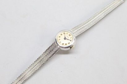 null MOVADO

Montre bracelet de dame en or gris 18k (750) à boitier rond, cadran...