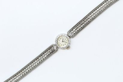 MOVADO MOVADO

Montre bracelet de dame mécanique en or jaune 18K (750), à boîtier...