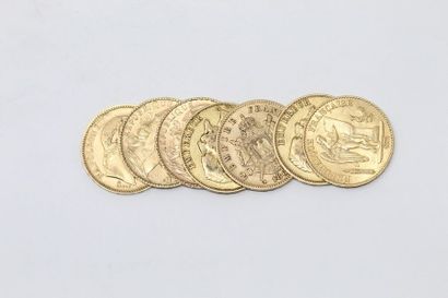 Lot de sept pièces en or de 20 francs : 

-...