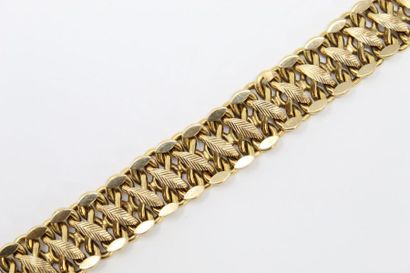 null Bracelet en or jaune 18k (750) à maille stylisant des feuilles. 

Tour de poignet...