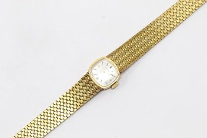 null Montre bracelet de dame en or jaune 18k (750), cadran quadrilatère à fond gris...