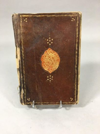 null Persian manuscript, leather binding.

Cut binding, missing a medallion, pages...