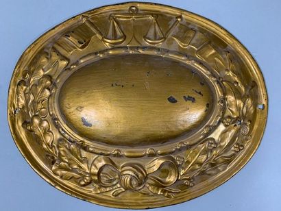 null Bailiff's sign in repoussé copper, oval in shape, decorated with a garland of...