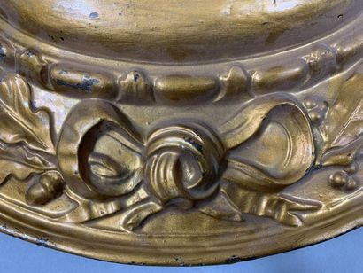 null Bailiff's sign in repoussé copper, oval in shape, decorated with a garland of...
