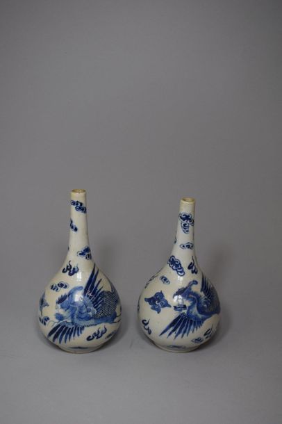 null China for Vietnam 19th. Pair of Blue d'Hué porcelain vases decorated with phoenix...