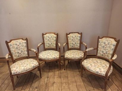 null Suite of four armchairs with floral tapestry, Louis XVI style