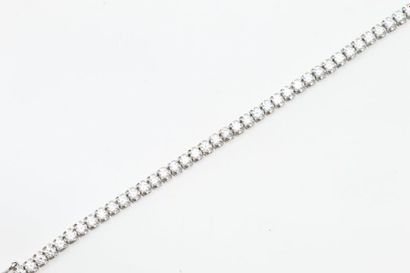 Bracelet ligne en or gris 18k (750) orné...