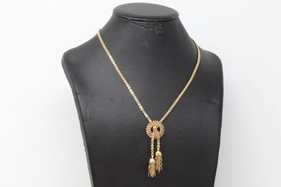 null Collier négligé en or jaune 18k (750) stylisant deux pompoms. 

Poids : 19 ...