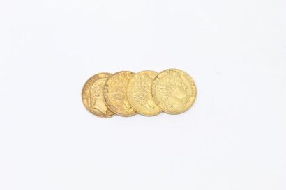 Ensemble de quatre pièces en or de 20 francs...