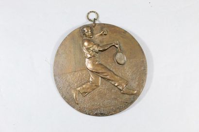 null BRUNSWICK L. 

Médaille en bronze figurant un joueur de tennis. Sbg, J. Natter...