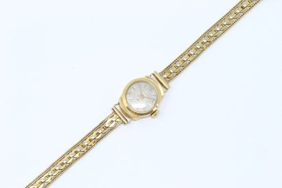null Montre bracelet de dame, boîtier rond en or jaune 18k (750), cadran à fond crème,...