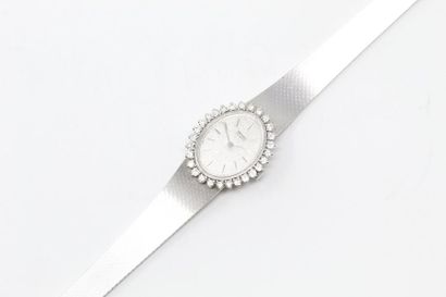 null Montre bracelet de dame, boîtier ovale en or gris 18k (750), cadran à fond gris...