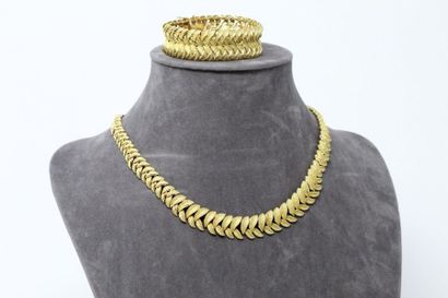 EMILE RATON RATON CYLINDER

Necklace and bracelet in 18K (750) yellow gold, made...