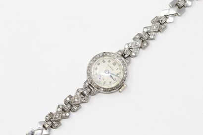 ROLEX ROLEX
Mechanical ladies' platinum bracelet watch with round case, seconds counter...