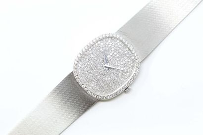 CHOPARD CHOPARD

Tuxedo bracelet watch in 18K (750) white gold and diamonds. Oval...