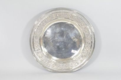null Large circular silver dish (Charençon) decorated in the taste of the Renaissance....