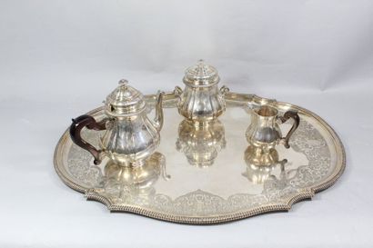 null Silver tea service (950) in the form of a baluster, resting on a frame; decorated...