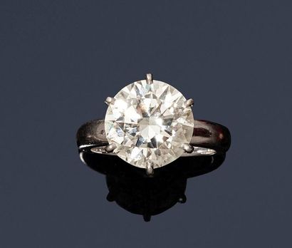  Ring in 18K (750) yellow gold and platinum, set with a brilliant-cut diamond. 
Diamond...