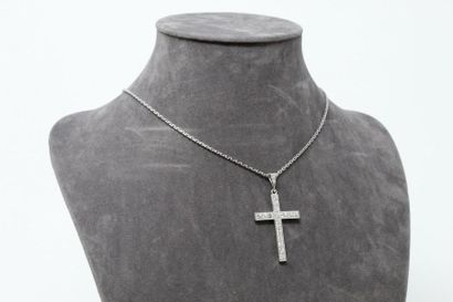 null Platinum cross pendant set with seventeen diamonds, the chain with gold filed...