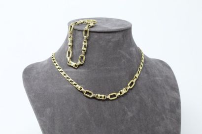 null Necklace and bracelet in 18K (750) yellow gold, the first one articulated with...