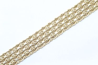 null Flexible 18K (750) yellow gold flat mesh bracelet.

Length: approx. 20 cm -...