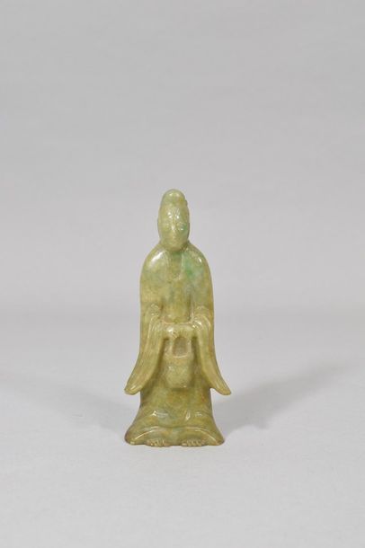 null Statuette en jadéite figurant un personnage portant un panier 

Chine 

H. :...