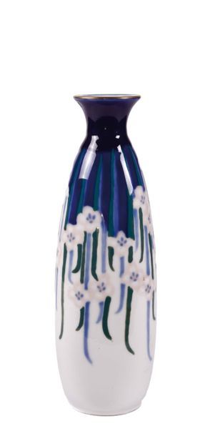 null Camille THARAUD (1878-1951)

Vase en porcelaine a corps ovoide epaule et col

conique....
