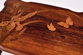 null Emile GALLE (1864-1904)

Walnut tea table with inlay and moulding

of different...