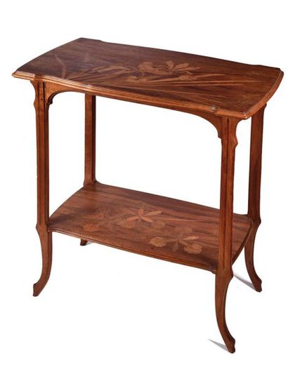 null GALLE

Table with two tops in walnut with carved molding

and top plate in marquetry...