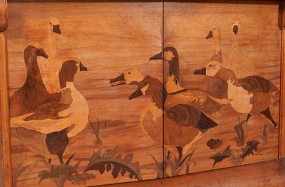 null Louis MAJORELLE (1859-1926)

Buffet Ducks in walnut with carved moulding and

inlaid...