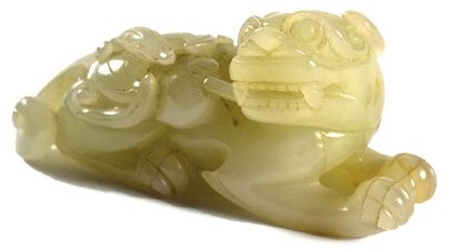 null CHINA - 20th century

Statuette of a tiger lying in celadon nephrite, head turned...