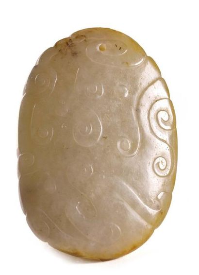 null CHINA - Early 20th century

Small oval-shaped celadon nephrite medallion decorated...