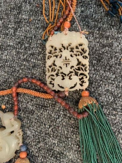 null CHINA - 20th century

Set of two necklaces with three nephrite pendants each,...